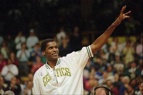 ADVANCE FOR WEEKEND JAN. 17-18--This is an April 1994 file photo showing former Boston Celtic Robert Parish waving to the crowd at the Boston Garden in Boston, during one of his last games as a Celtic. Parish will have his well-known jersey number-00 retired in ceremonies in Boston at the FleetCenter, Sunday, Jan. 18, 1998. (AP Photo/Jon Chase,File) library tag 12081999 sports Library Tag 09052003 Sports
